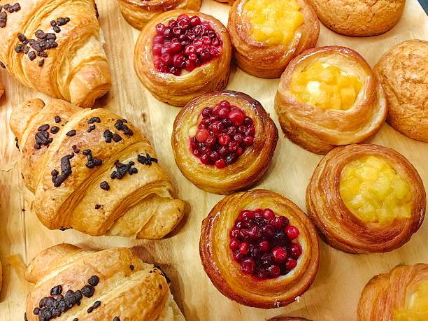Freshly baked pastries with fruit fillings and chocolate croissants